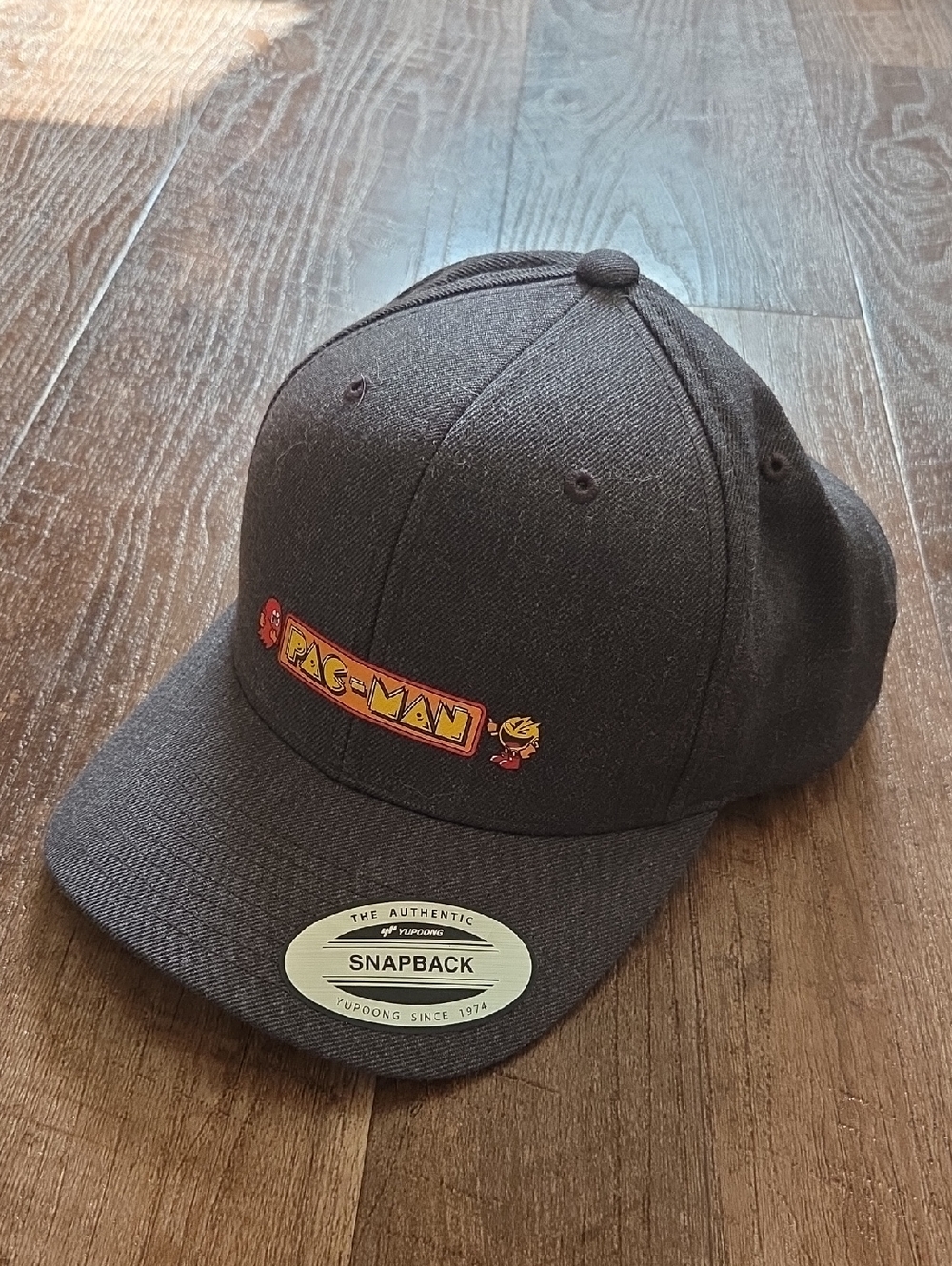 Pac-Man Logo Snapback Hat in Dark Gray